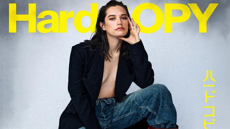 Ella Bleu covers HardCopy Magazine’s “Fantazia” issue in an overcoat and designer denim. HardCopy Magazine