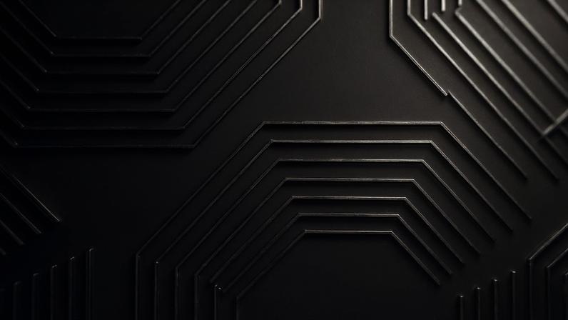 A black background with 3D Octagonal elements