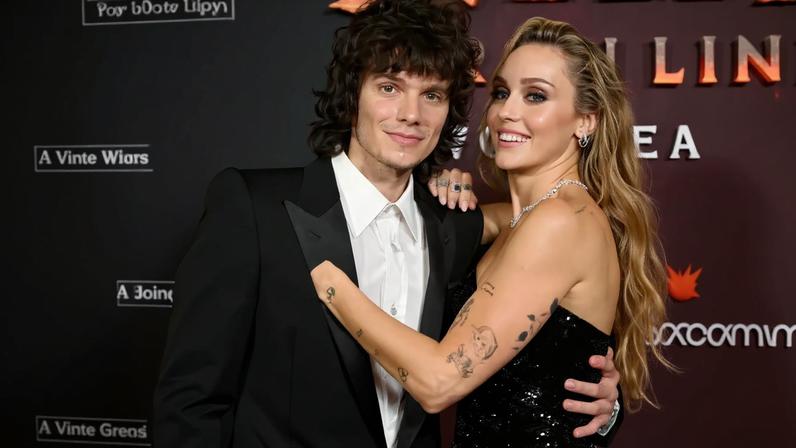 Miley Cyrus sparked engagement rumors by rocking a show-stopping diamond set in a thick gold band on her left ring finger during a red carpet date night with her boyfriend, Maxx Morando. FilmMagic