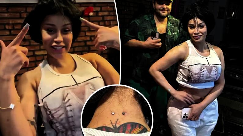Cardi B shows off new dermal piercings on her neck and back. nyc.piercing, Instagram