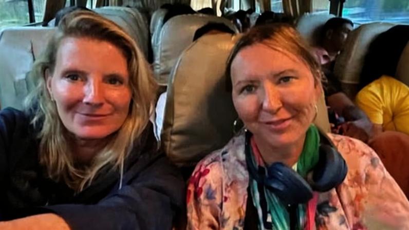 Melanie Watters (left) and Janine Reid’s car was nearly swept off a cliff when a landslide hit them during Cyclone Ditwah. Photograph: Supplied