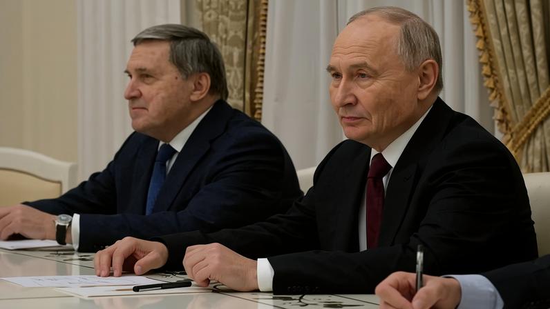 Another photo-op … Vladimir Putin with his foreign aide Yuri Ushakov in Moscow on Tuesday, where he met US envoy Steve Witkoff. Photograph: Kristina Kormilitsyna/Reuters