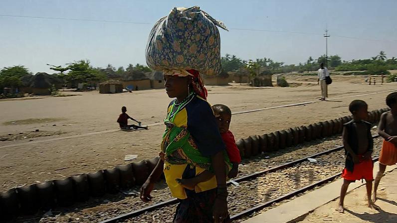 The railway line outside Benguela, southern Angola. Many homes in DRC are near the tracks. Photograph: Kim Ludbrook/EPA