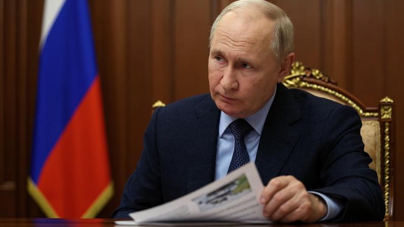Vladimir Putin attends a meeting with CEO of Rostec state corporation Sergei Chemezov in Moscow, Russia, December 28, 2023.