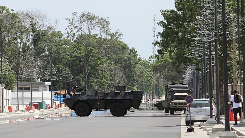 An armoured vehicle seen on a street in Benin after the foiling of ‘an attempted mutiny’.