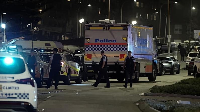 Police cordon off an area at Bondi Beach after a reported shooting in Sydney, Sunday, Dec. 14, 2025.