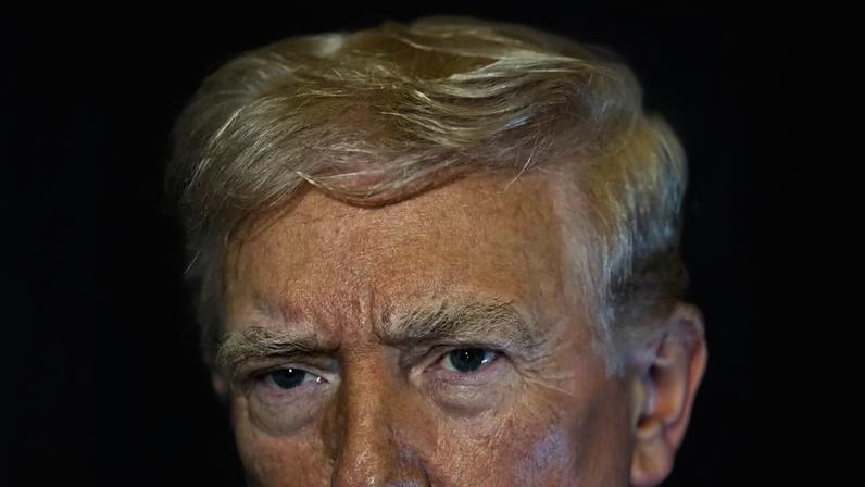 Donald Trump speaks to reporters on Air Force One during travel to Washington DC on 30 November. Photograph: Anna Rose Layden/Reuters