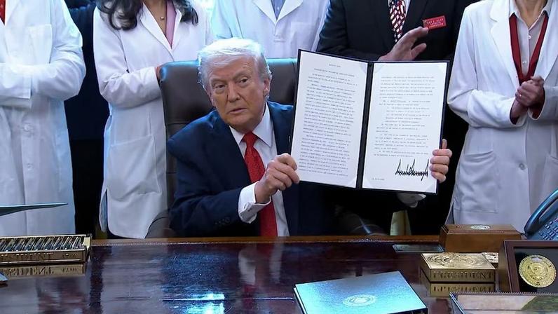 President Donald Trump signing an executive order
