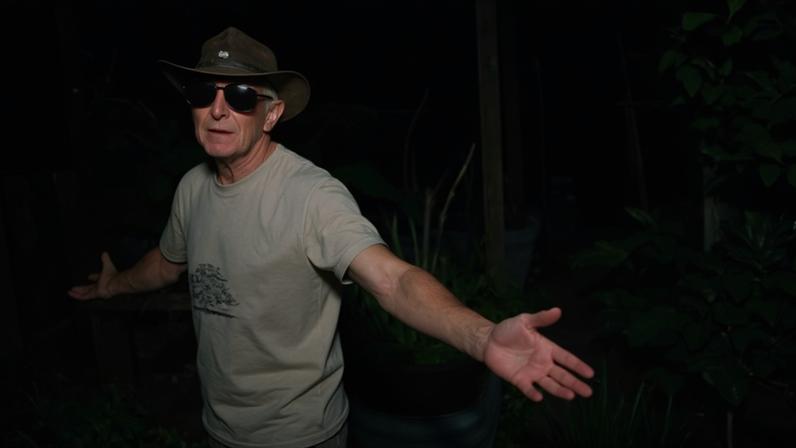 Bill Smart in his garden, one of three cultivation spaces he manages in Currumbin Ecovillage.