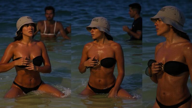 Saudade de Maria de Fátima? Bella Campos curte véspera de Natal em praia do Rio e exibe corpão de biquíni sem alças; veja fotos