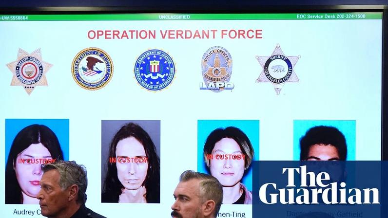 Photos of suspects of a terror plot are shown on a screen during a press conference 15 December 2025, in Los Angeles. (AP Photo/Damian Dovarganes)