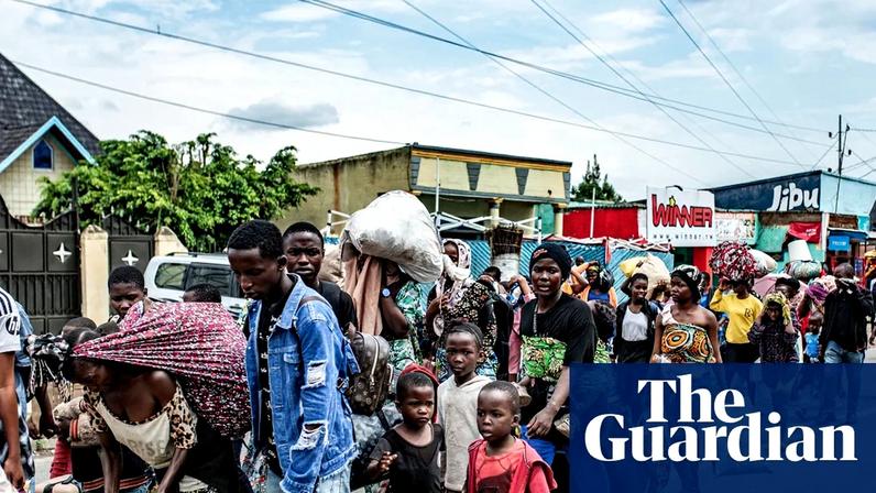People arrive in Rwanda after fleeing intense shelling in the bordering Kamanyola region of DR Congo.