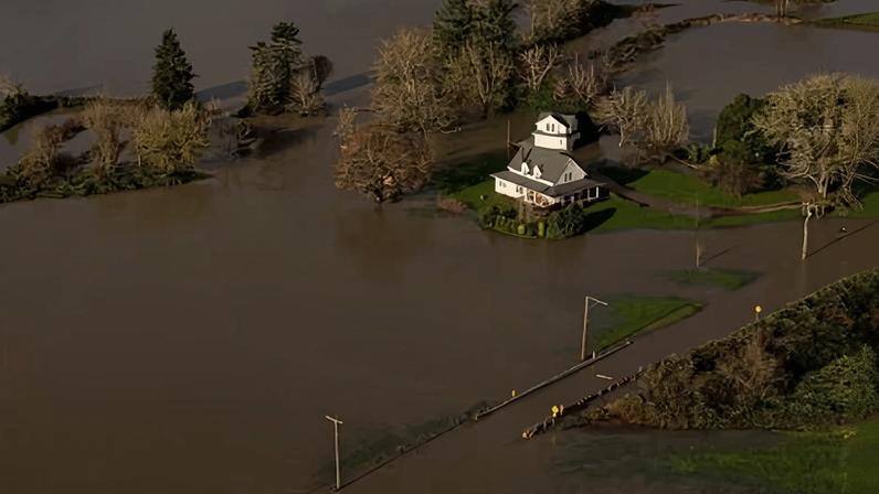 A home flooded by the Snoqualmie River in Fall City, Washington. Photograph: David Ryder/Reuters