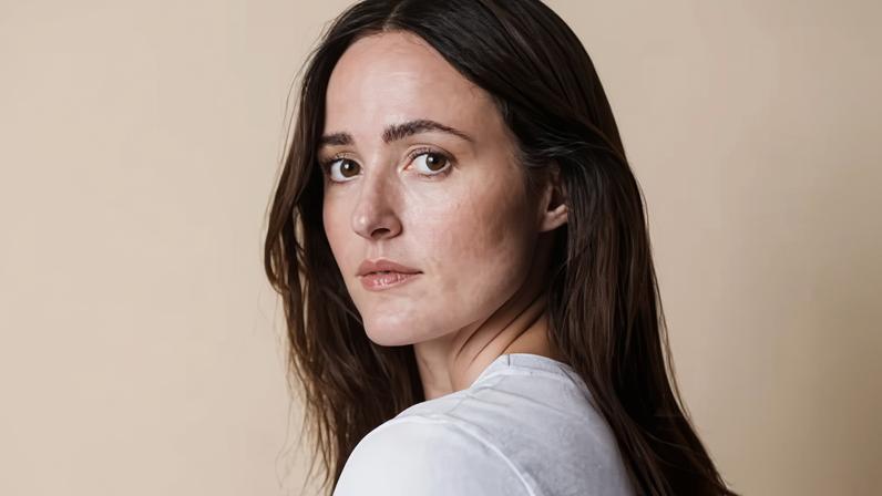 Renate Reinsve in a white top