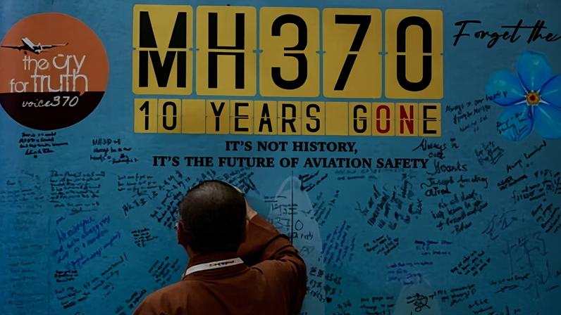 Visitors write messages at and event in Petaling Jaya, Malaysia, last March to mark the 10th anniversary of the disappearance of flight MH370.