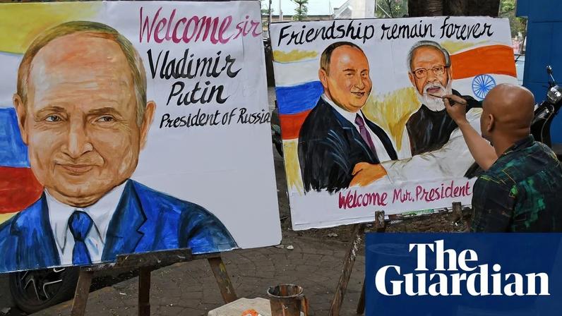 A teacher paints a poster welcoming Russian president Vladimir Putin to India. The meeting with Narendra Modi comes at a politically perilous time for both countries.
