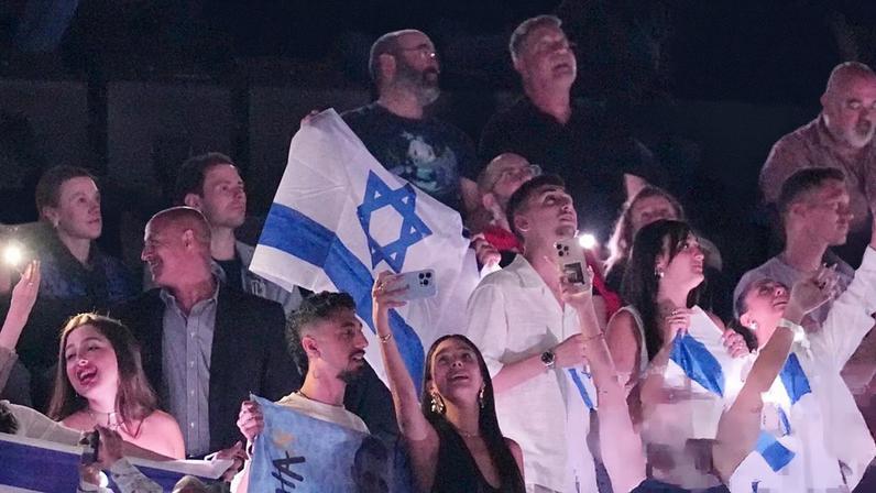 Israeli fans cheer for Yuval Raphael at this year’s Eurovision in Basel, Switzerland.