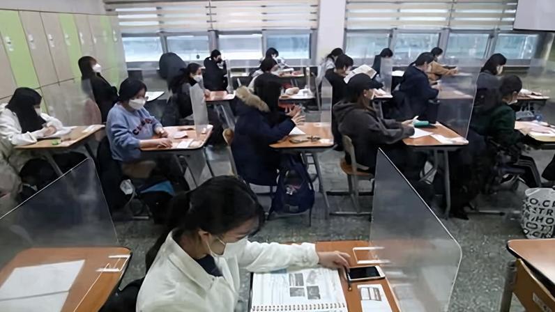 South Korean students take a college entrance exam in Seoul. Photograph: Chung Sung-Jun/Getty Images