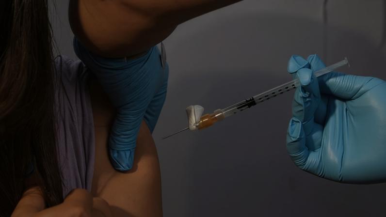 A child receives a dose of Pfizer's Covid vaccine. Photograph: Frederic J Brown/AFP/Getty Images