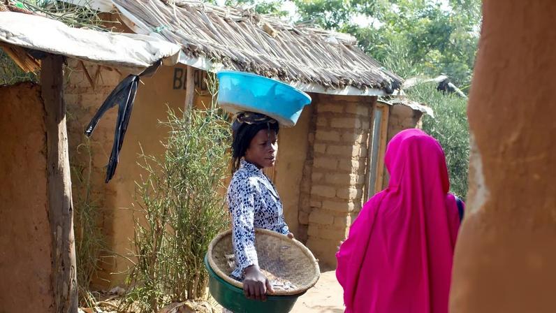 Two refugees at Uganda’s Nakavalie camp. Uganda used to get $240m annually from the UN refugee agency but has received only $18m this year. Photograph: A Lichtenstein/Corbis/Getty