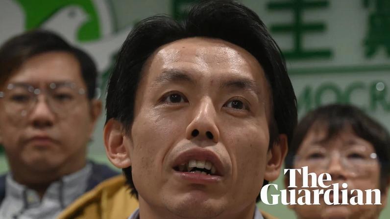 Lo Kin-hei, the chair of the Democratic party, holds a press conference on Sunday after the vote to disband the party.