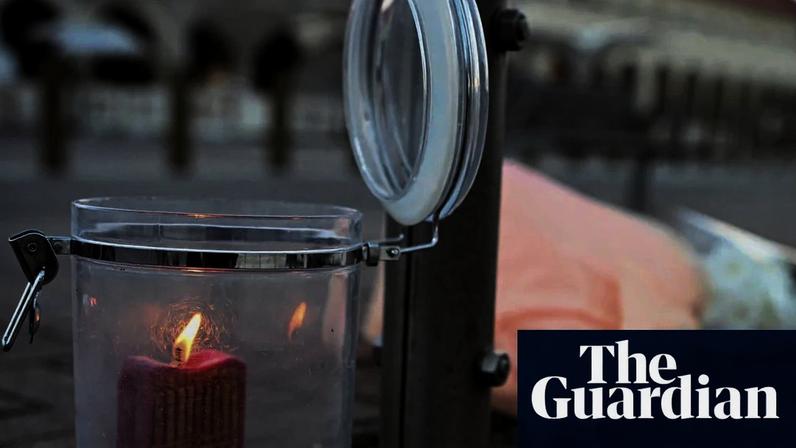 Candles burn following the attack on a Jewish holiday celebration at Bondi beach in Sydney