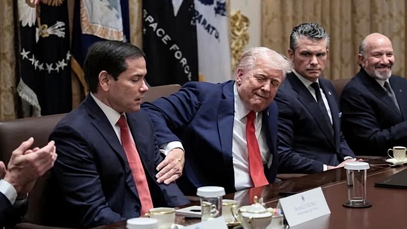 Donald Trump with secretary of state Marco Rubio, defense secretary Pete Hegseth and commerce secretary Howard Lutnick at a cabinet meeting on 9 October 2025.
