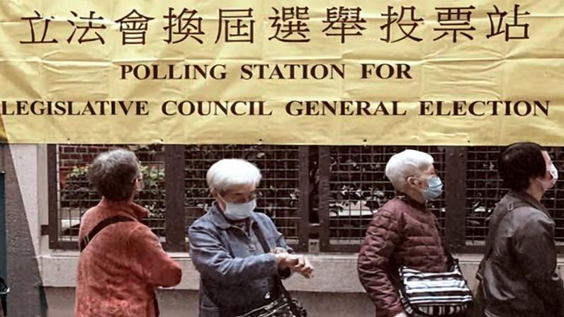 LegCo voters wait to cast their ballot at a polling station in Wan Chai, Hong Kong. Composite: Guardian Design/REX/Shutterstock