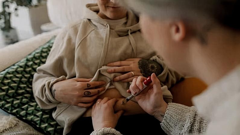 A women doing IVF test with syringe at home. Photograph: Maskot/Getty Images