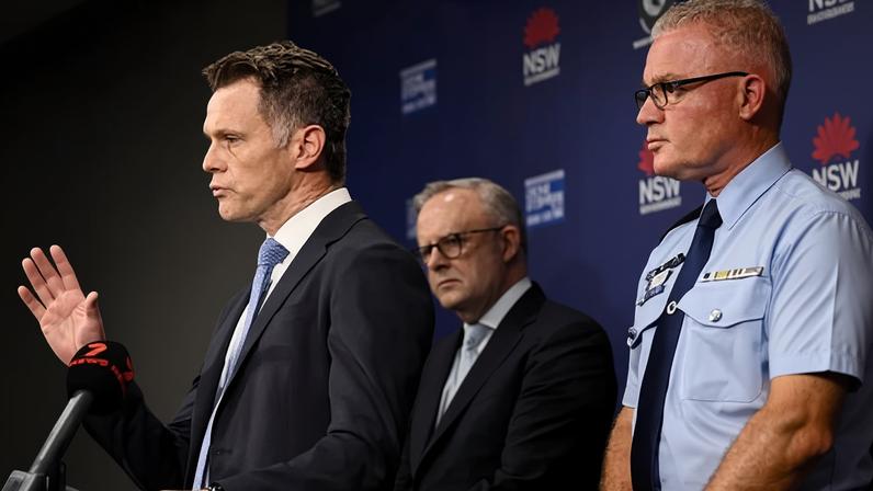 The NSW premier, Chris Minns, the prime minister, Anthony Albanese, and the NSW police commissioner, Mal Lanyon. The premier and commissioner have defended the police response to the Bondi attack.