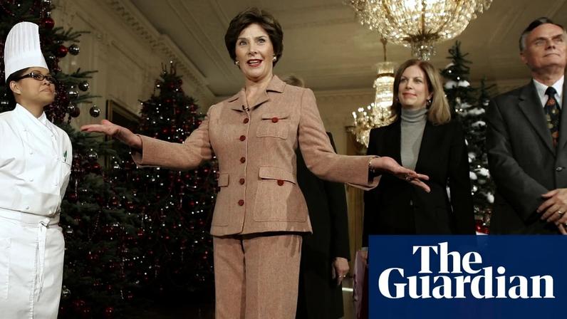 First lady Laura Bush, center, introduce from l-r, White House chef Cris Comerford, White House social secretary Lea Berman, and White House usher Gary Walters, as she hosts a media preview of the 2006 holiday decorations at the White House in Washington on 30 November 2006.