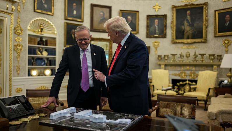 US president Donald Trump (right) shows a maquette of the East Wing ballroom to Australian prime minister Anthony Albanese (left) during a state visit to the White House in October