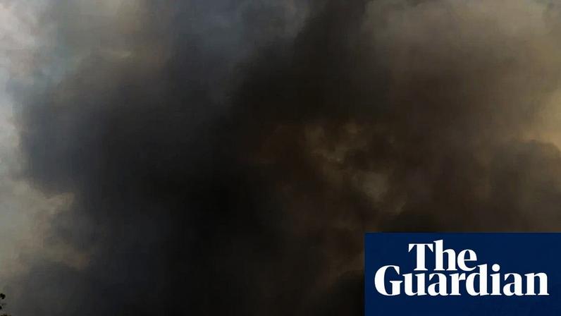 Smoke from a bushfire near the town of Nerong, south of Bulahdelah in New South Wales. Photograph: Blake Sharp-Wiggins/The Guardian