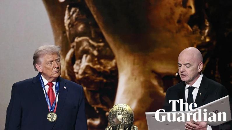 Trump wears his medal awarded by the Fifa president Gianni Infantino.