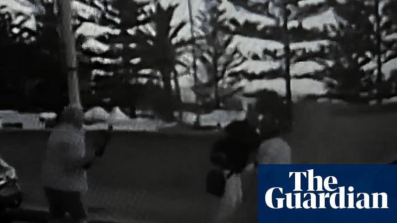 Dashcam footage shows couple attempting to stop Bondi gunman – video