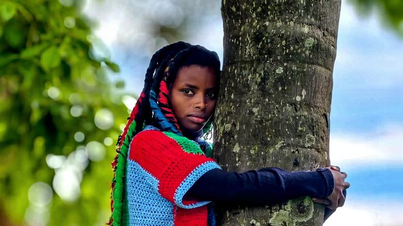 Truphena Muthoni hugging a tree for 72 consecutive hours. Image by Nyeri Governor Mutahi Kahiga via X.