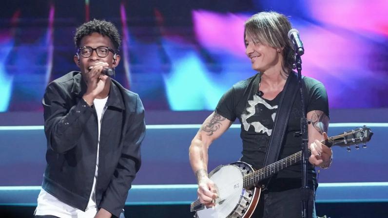 Breland says he's giving Keith Urban, his frequent collaborator, the benefit of the doubt after Urban played Trump's Mar-a-Lago.