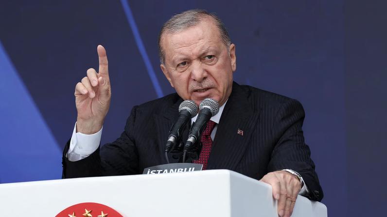 Turkish President Tayyip Erdogan speaks during a ceremony for the handover of new vehicles to the gendarmerie and police forces in Istanbul, Turkey, November 28, 2025. REUTERS/Murad Sezer/File Photo