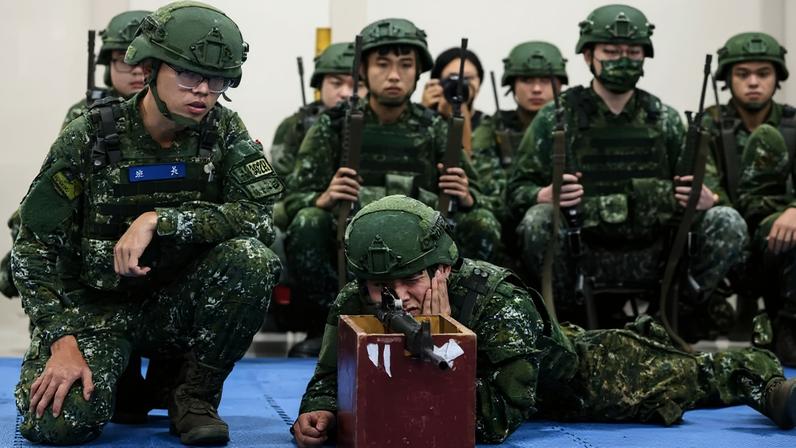 Taiwanese reservists participate in pre-combat training.