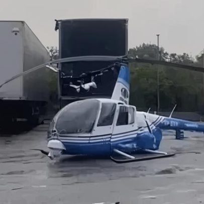 Helicóptero da Band cai na Rodovia Dutra em Guarulhos