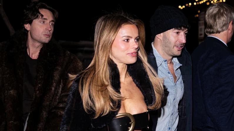 Brooks Nader was seen wearing a wide double-buckle Chloé belt as a top while out partying in Aspen with friends.