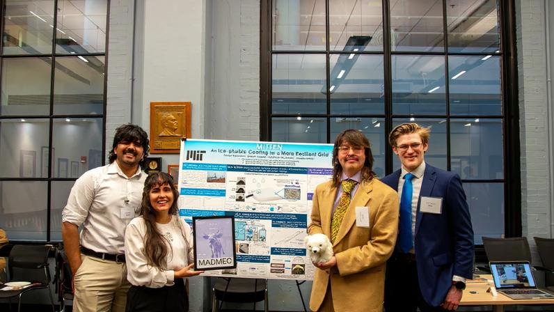 Caption: Team MITten took first place in the 2025 MADMEC innovation contest for its spray-on coating designed to prevent ice from forming on power lines. From left to right: Shaan Jagani, Amber Velez, Matthew Michalek, and Trevor Bormann.