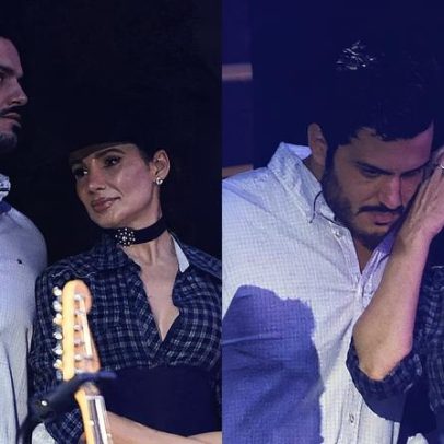 Paula Fernandes é vista no show ao lado de moreno misterioso