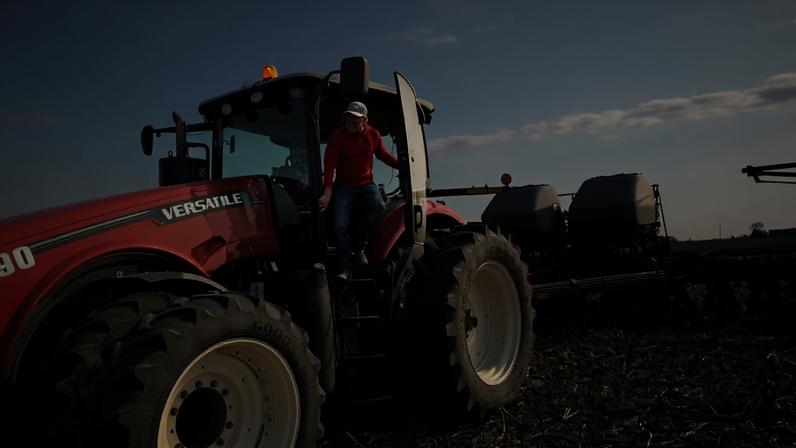 Dan Duffy uses a tractor to plant soybeans on land he farms with his brother near Dwight, Illinois.
