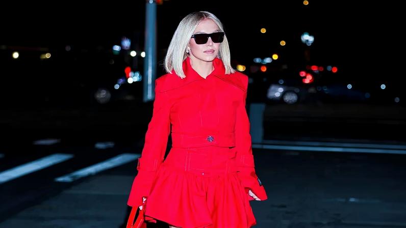 Sydney Sweeney turned heads in a vibrant red custom Patou ensemble for dinner at The Corner Store in Soho on Dec. 1. GC Images