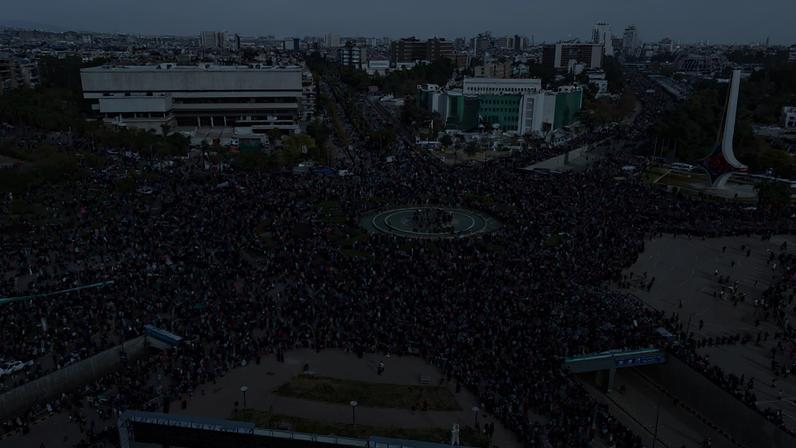 People celebrating a year since the ousting of longtime ruler Bashar al-Assad, in Umayyad Square, in the Syrian capital of Damascus.