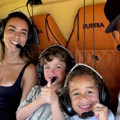 Eder Militão posa com a família em passeio de helicóptero