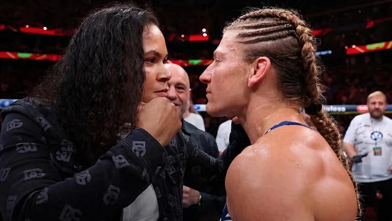 Amanda Nunes e Kayla Harrison se encaram no Octógono do UFC 316, em junho de 2025. (Ed Mulholland/Zuffa LLC)