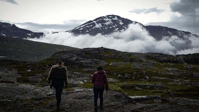 Documentarian Nina Paninnguaq (left) and Ruth, a subject of the film *Walls - Akinni Inuk*, walk in Nuuk, Greenland, in an undated photo.