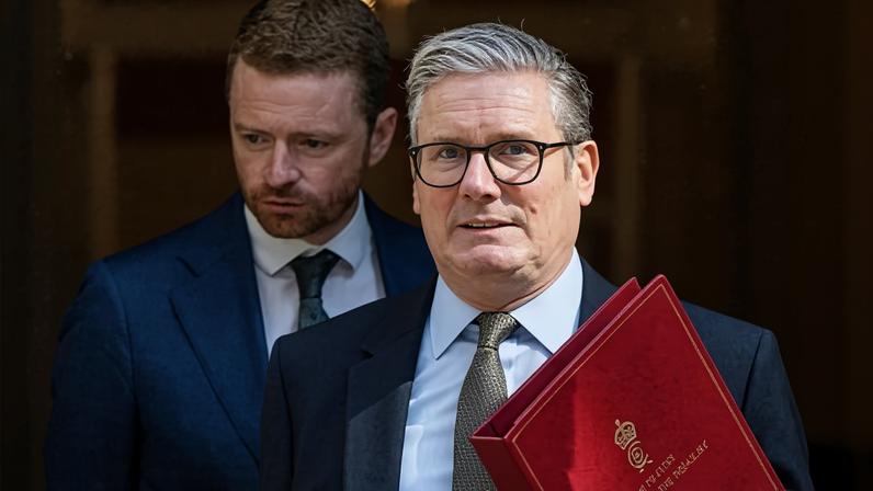 Keir Starmer, pictured with Morgan McSweeney, told his cabinet that the government had to keep a tight domestic focus.